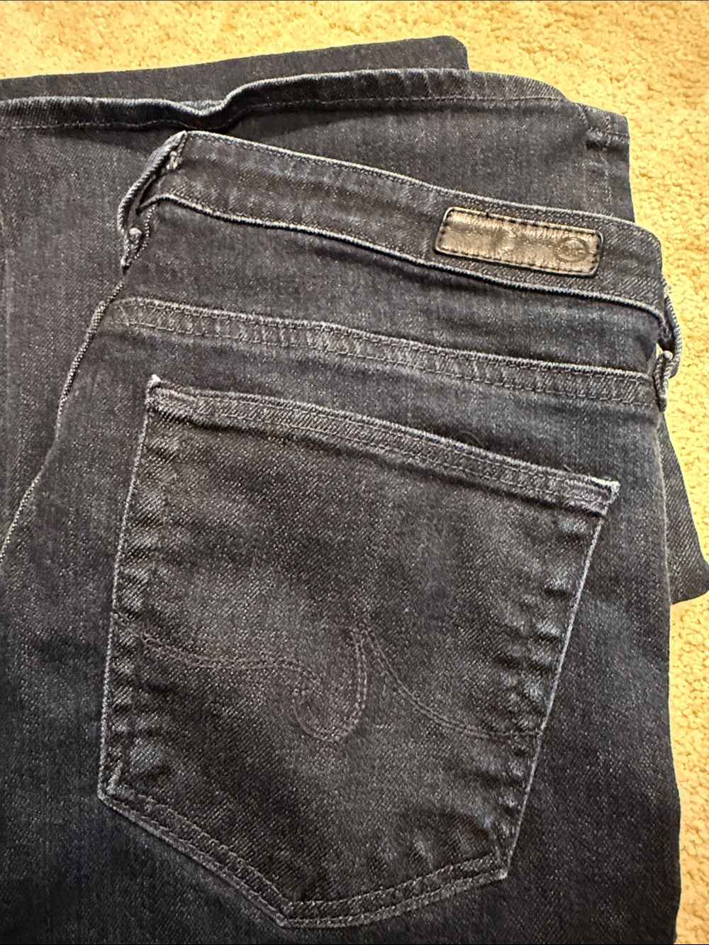 AG the angel boot cut dark denim jeans